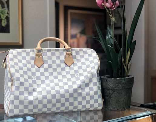 POWERED BY BUSINESS.Louis Vuitton Speedy 35