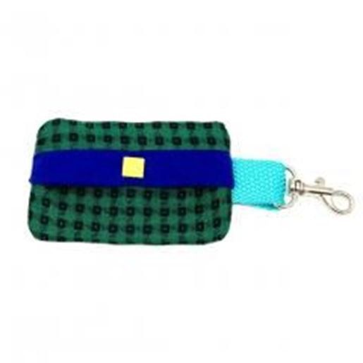 Foto de Green plaid dog waste bag holder with suede lining