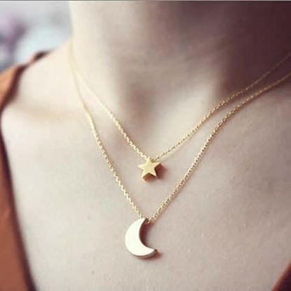 Picture of Golden Moon and Star Charms on a Layered Chain Necklace